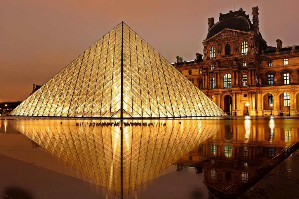 Night view of Louvre Museum in Paris, France